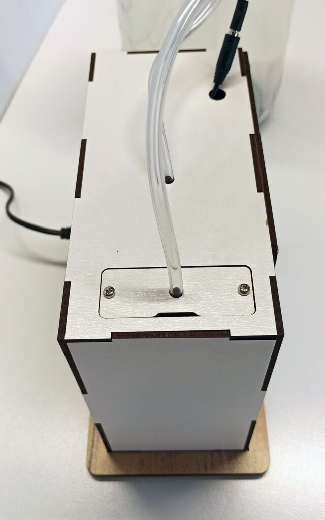 Top view of FLO-GROW auto curing unit with air tubing